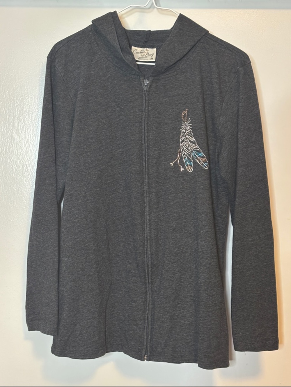 Woman’s Dark Gray Hooded Zip-Up Top with Feather Detail